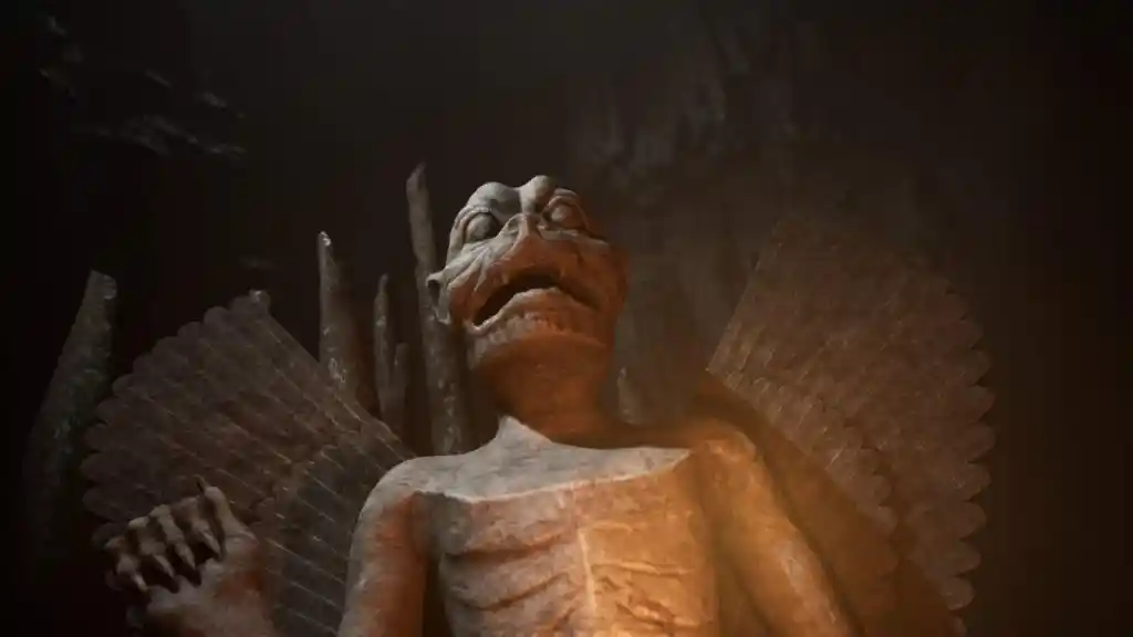 The statue of a winged vampire underground