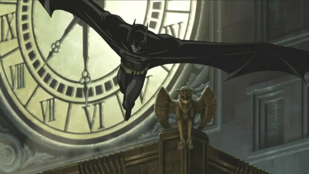 Batman glides from a clocktower