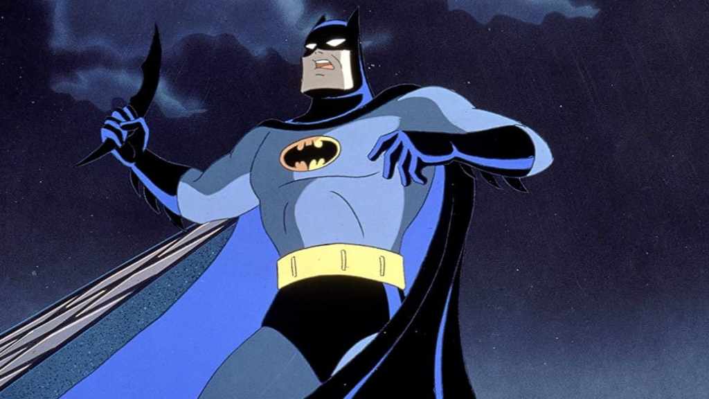 Batman readies a batarang as part of an article about the best DC animated movies.