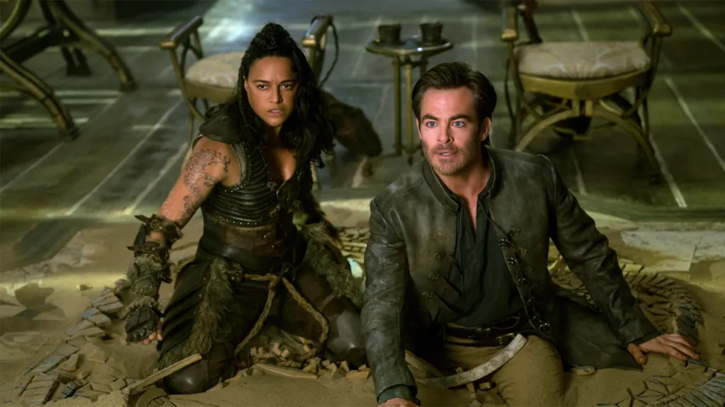 Chris Pine and Michelle Rodríguez slipping into the floor. Dungeons Dragons: Honor Among Thieves