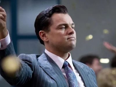 Leonardo DiCaprio pointing his finger in The Wolf of Wall Street.