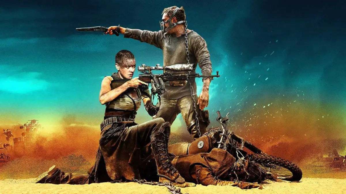 Key art for Mad Max: Fury Road featuring Max and Furiosa standing side by side, holding guns.