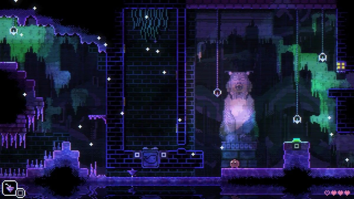 Captura de pantalla de Animal Well de una habitación con una gran estatua de lince al fondo.