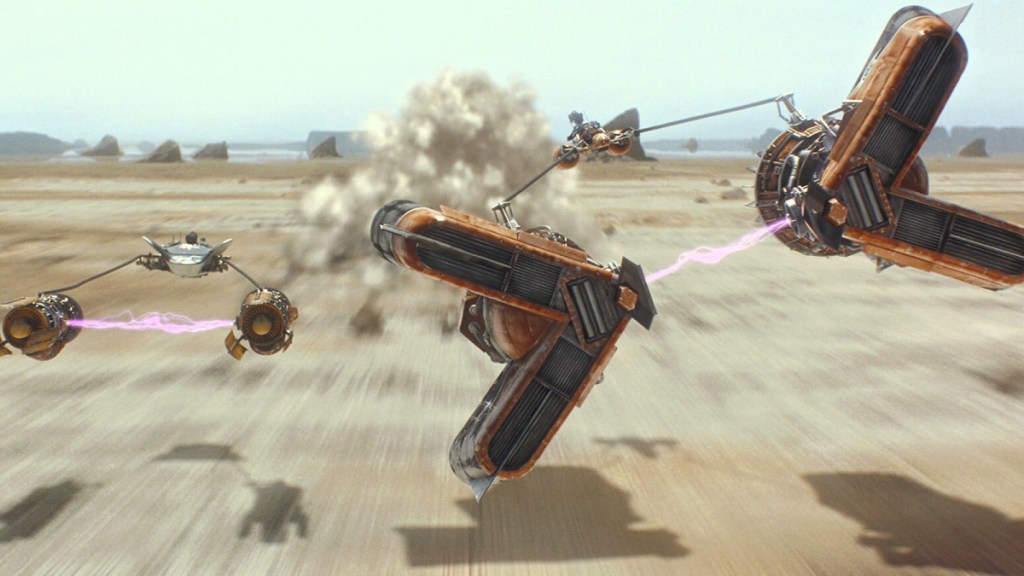 Anakin Skywalker and Sebulba's podracers side-by-side in Star Wars: The Phantom Menace