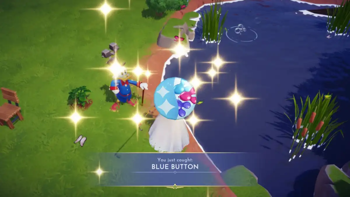 Image of a blue button after being fished up in Disney Dreamlight Valley