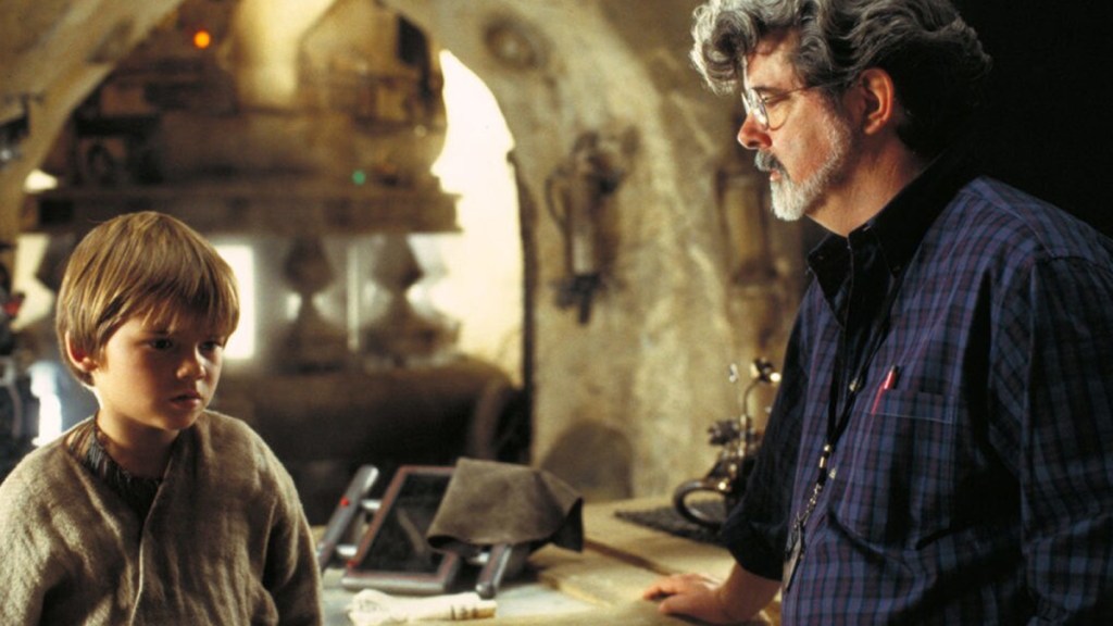 George Lucas and Jake Lloyd in a Star Wars: The Phantom Menace behind-the-scenes still
