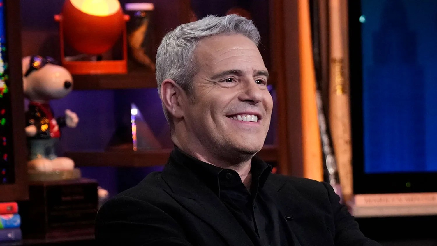 Andy Cohen smiling.