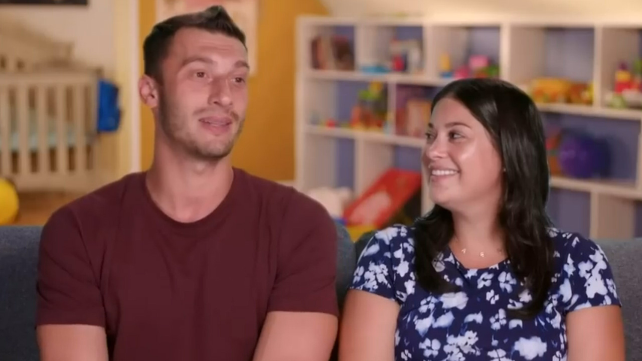Alexei and Loren from 90 Day Fiance, sitting side-by-side.