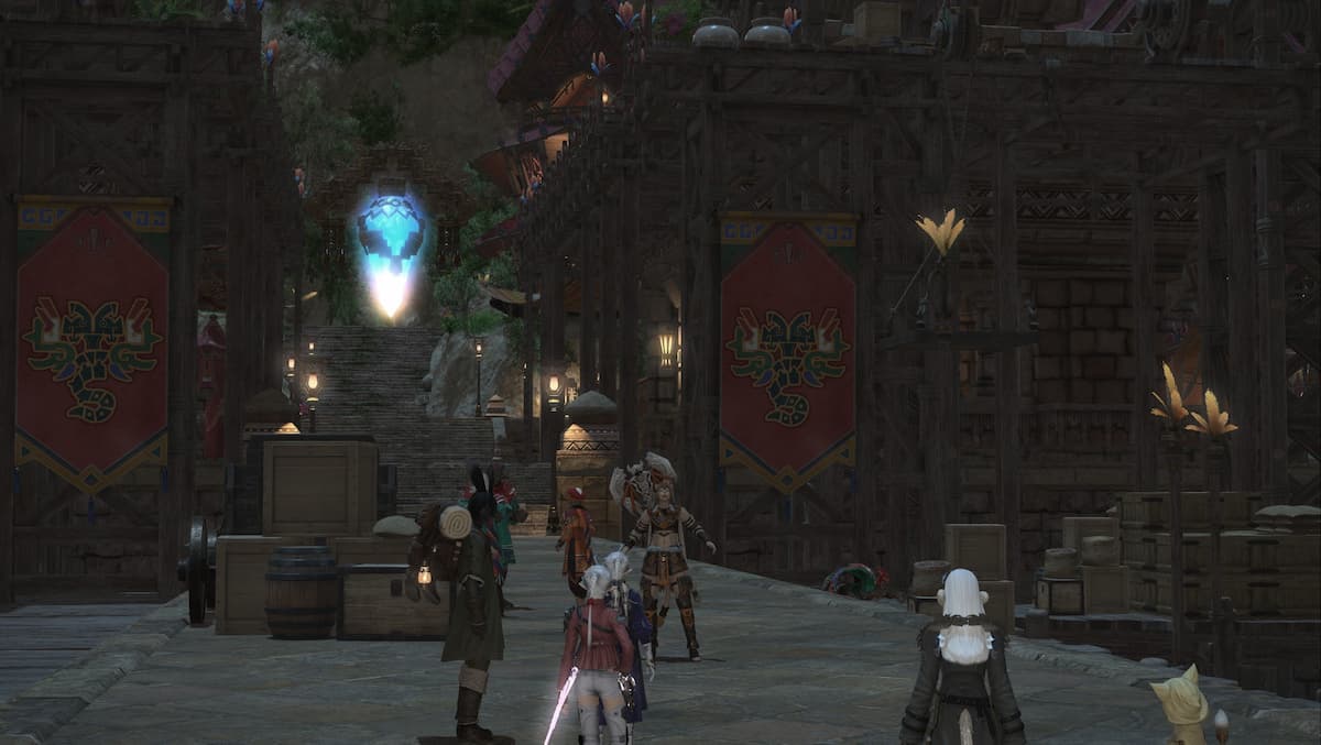 a screenshot of tuliyollal in ffxiv dawntrail with the characters talking at the bottom of stairs at night
