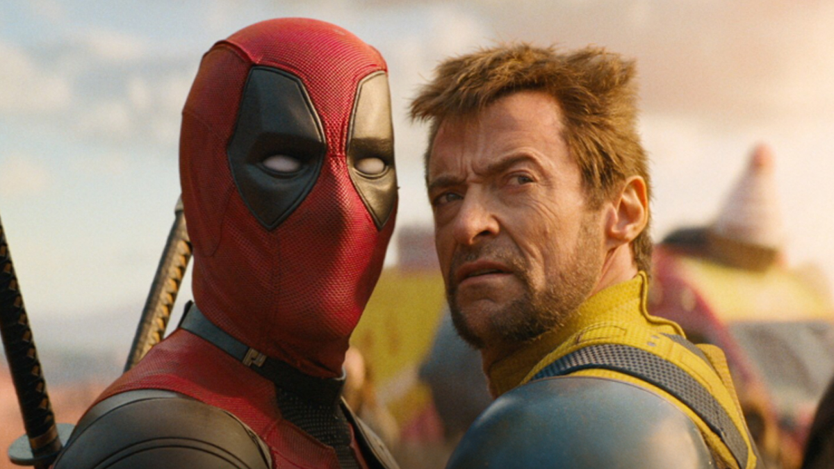 Deadpool & Wolverine stand shocked staring at something