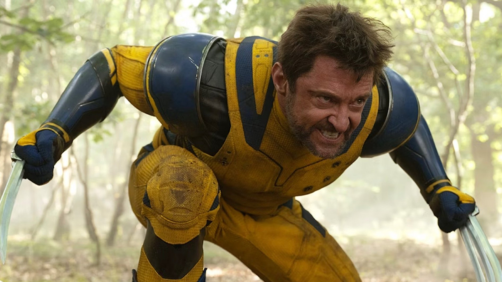 Wolverine crouches and bears his claws in Deadpool & Wolverine