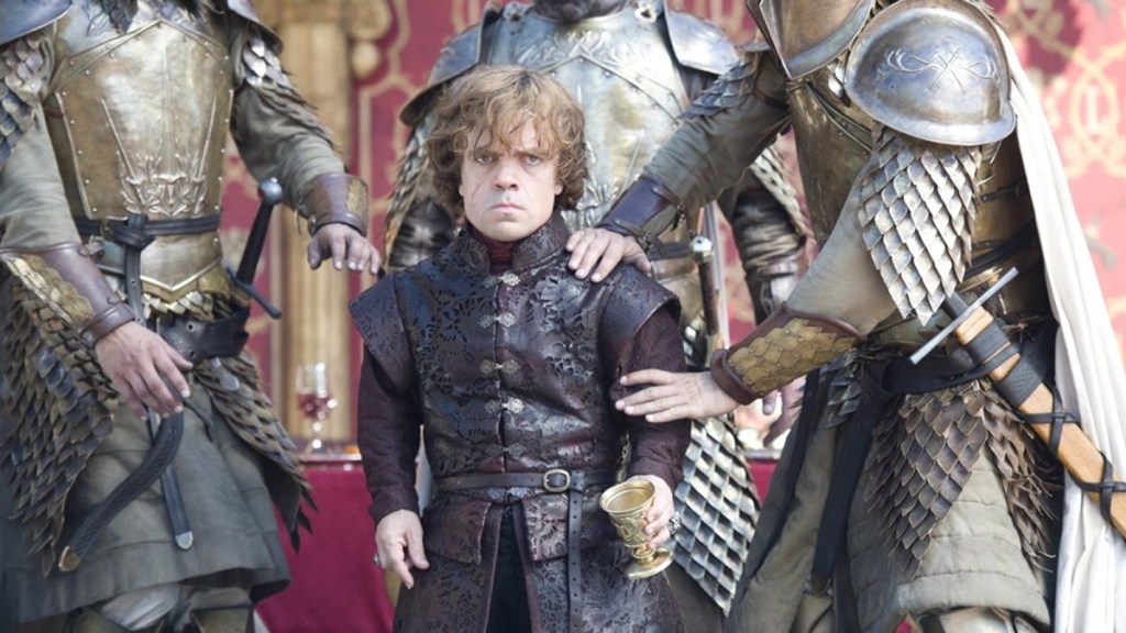 Tyrion surrounded by Kingsguard knights at the Purple Wedding in Game of Thrones Season 4, Episode 2