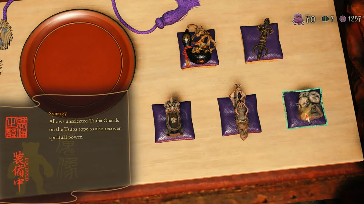 Image of a wooden table with a variety of tokens on small pillows 