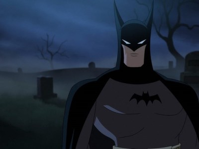 Batman standing in a graveyard in Batman: Caped Crusader