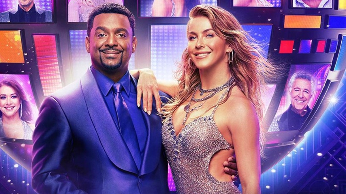 Dancing with the Stars hosts Alfonso Ribeiro and Julianne Hough. Hough rests an arm on Ribeiro's shoulder while he holds her waist. 