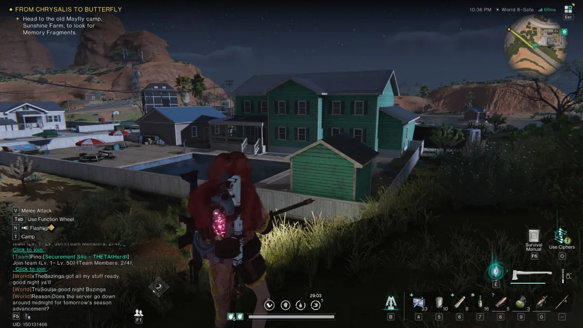 Image of the player standing on a grassy hill looking at the back of a bright green house in Once Human