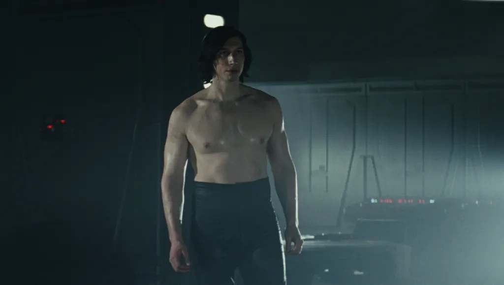 Kylo Ren stands shirtless in his room