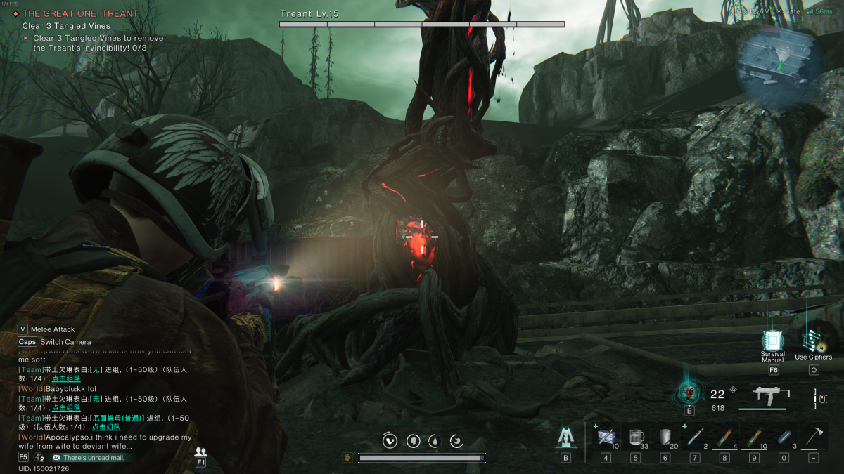 Image of the player looking down their sight at a vine that's rearing up out of the ground with a red node at its base in Once Human