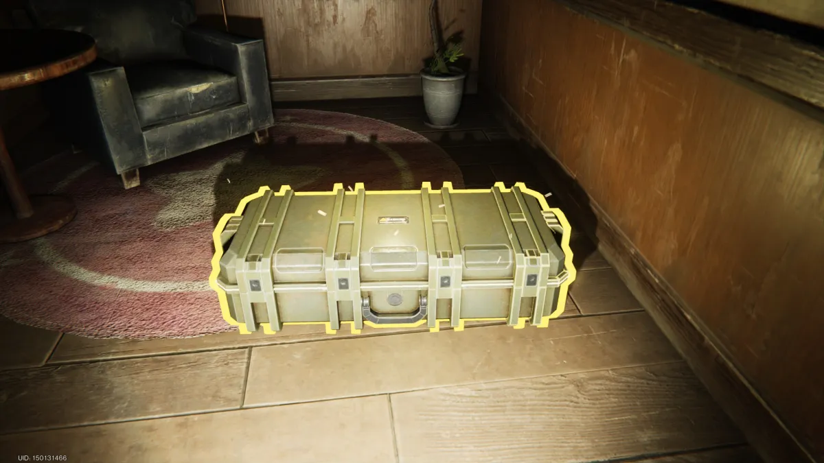 Image of a weapon crate on a wooden floor glowing in the dark in Once Human