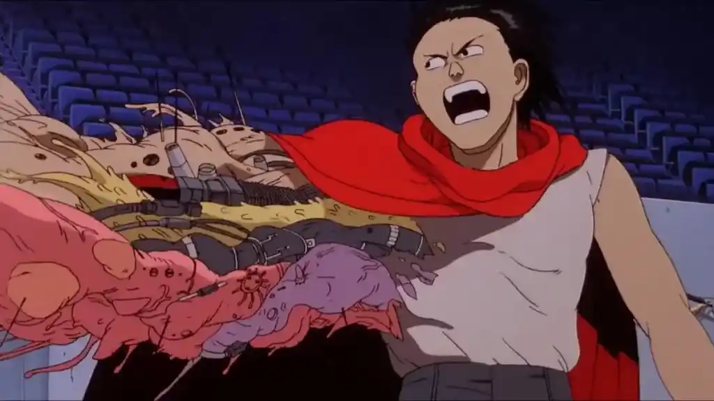 A man screams as flesh and technology burst through his shoulder in a stadium in anime movie Akira