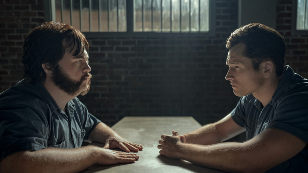 Taron Egerton and Paul Walter Hauser in Apple TV+ miniseries Black Bird, the two leaning over a narrow tableSecret Level: Which Video Games Are Featured in the Prime Video Anthology Series?