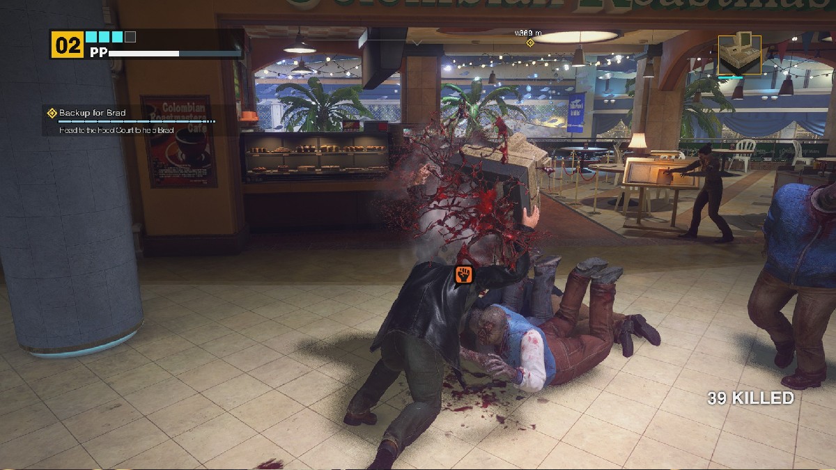 Frank West attacking a group of Zombies with a weapon in Dead Rising Deluxe Remaster in an preview of the game