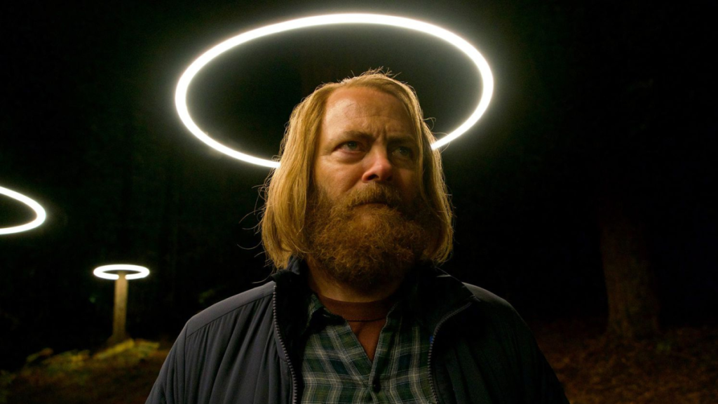 Nick Offerman as Forest in Devs, standing with a halo of light around his head