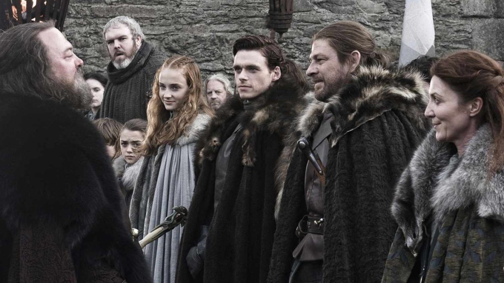 King Robert Baratheon is greeted by the Starks in Winterfell in Game of Thrones Season 1, Episode 1