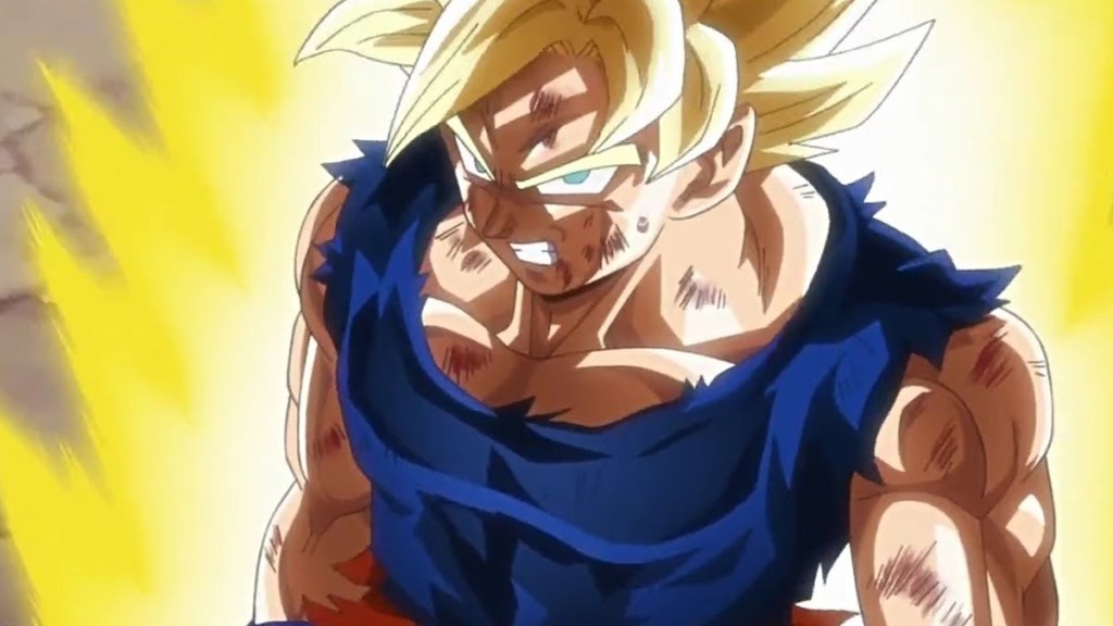 Goku glares up at someone as he goes super saiyan