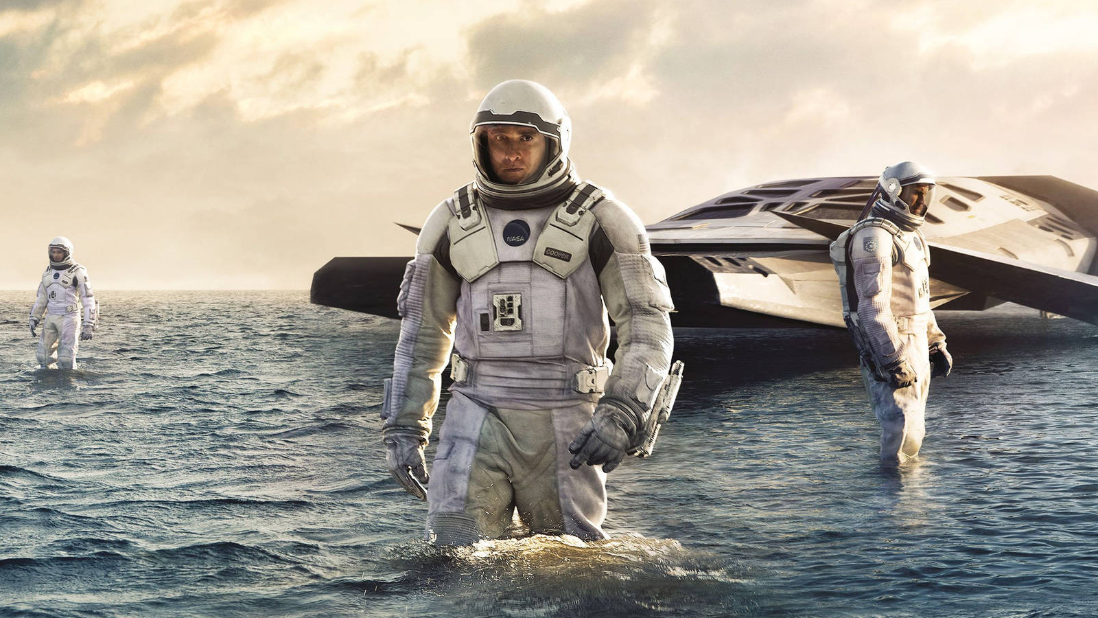 Cooper, Brand, and Doyle in Interstellar key art