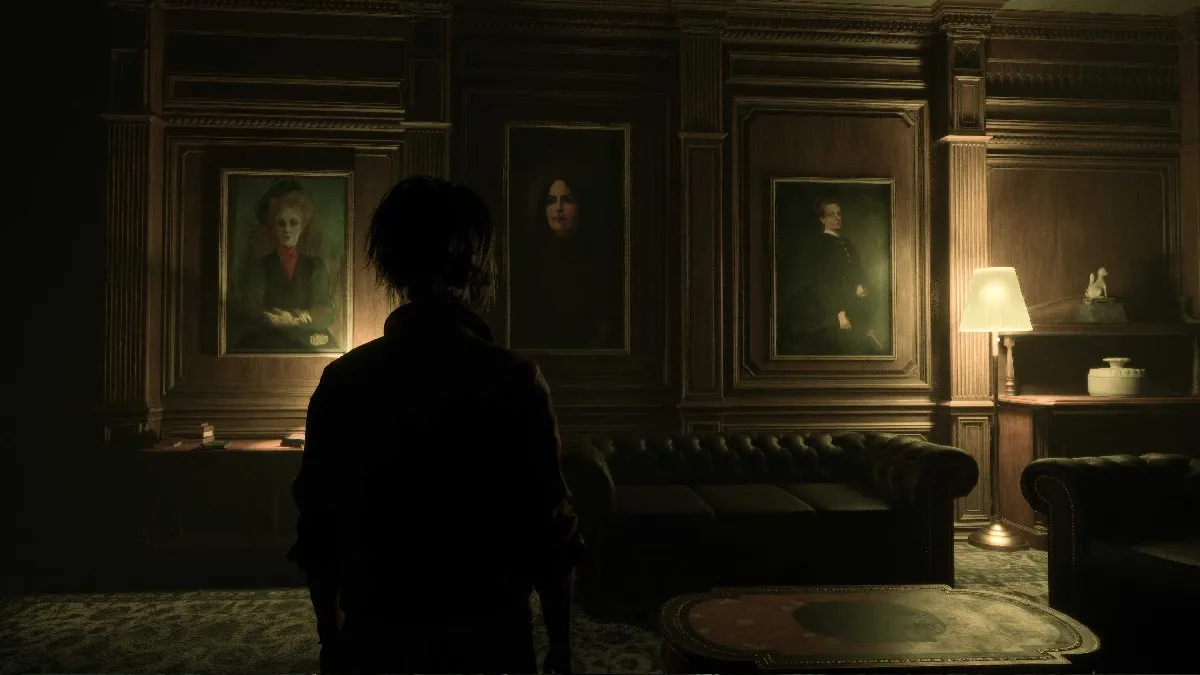 Three paintings on the wall of Gerant Manor in The Casting of Frank Stone, each featuring a darkly dressed person, and hung in a study