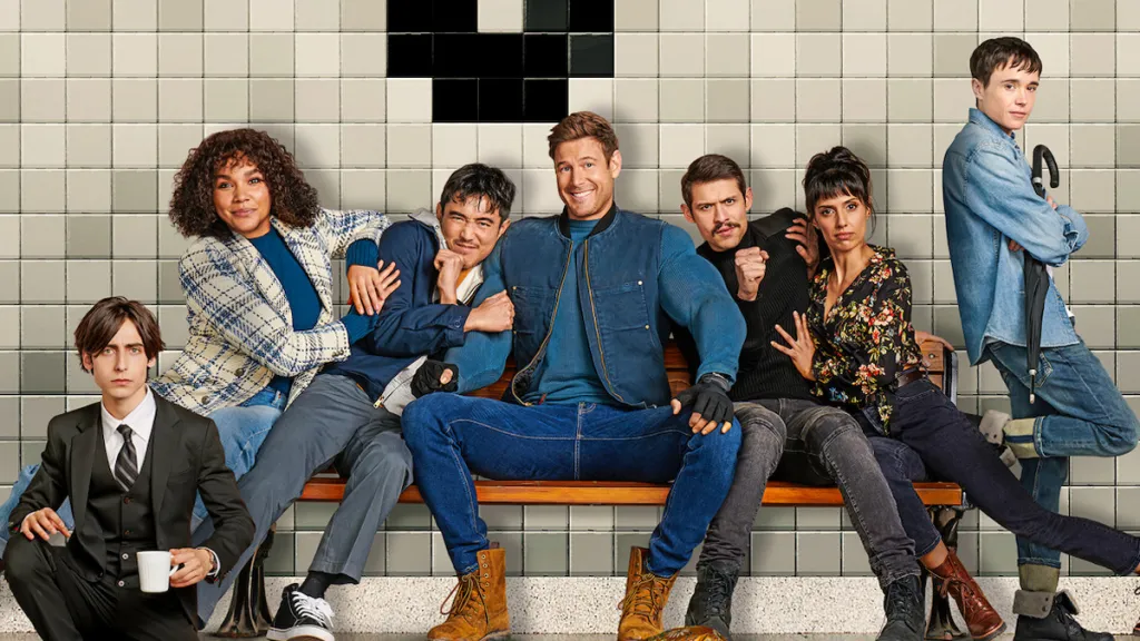 The Umbrella Academy Season 4 promotional image, featuring several people dressed in blue and black sitting on a bench staring at the camera