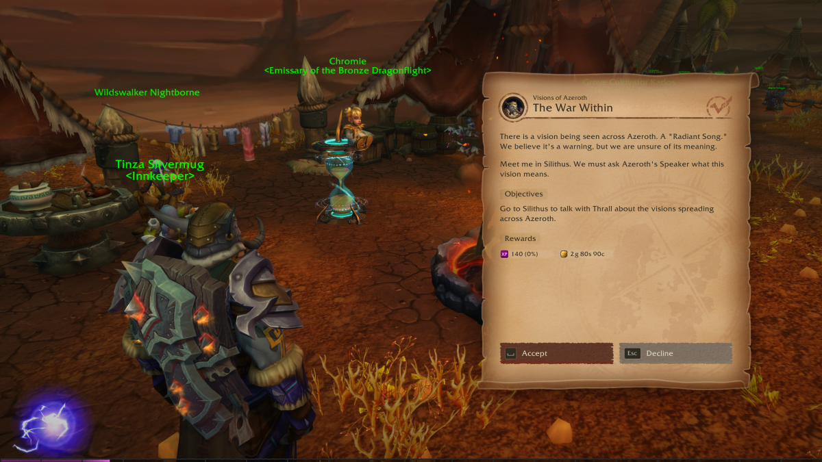 Image of a player standing in a red dust field with a quest pop up that says "The War Within" in World of Warcraft