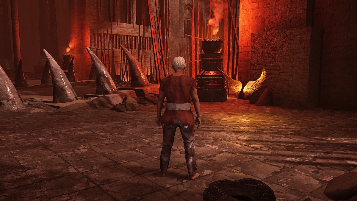 Image of a set of wings in a dungeon-like room filled with red light and teeth-like decor