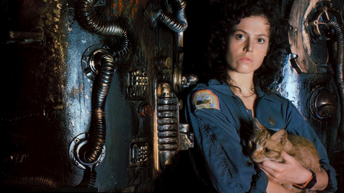 Ripley holding her cat