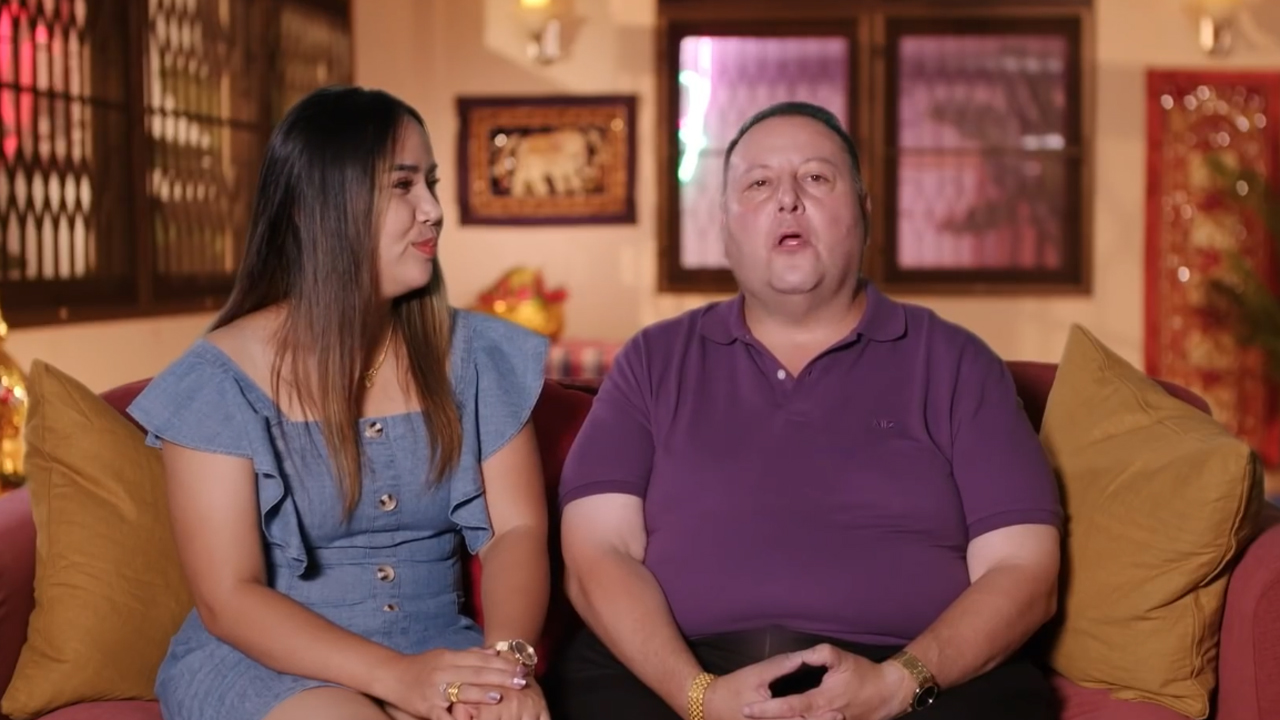 Annie and David from 90 Day Fiance, with Annie looking at David.