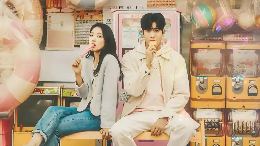 Yeo Jeong-woo and Nam Ha-neul eat ice cream in front of a store as part of an article about the Doctor Slump ending explained.