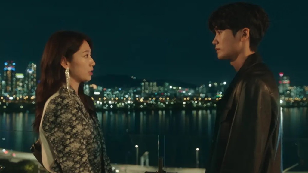 Ha-neul speaks to Jeong-woo by a river at night in the city as part of an article about the Doctor Slump ending explained