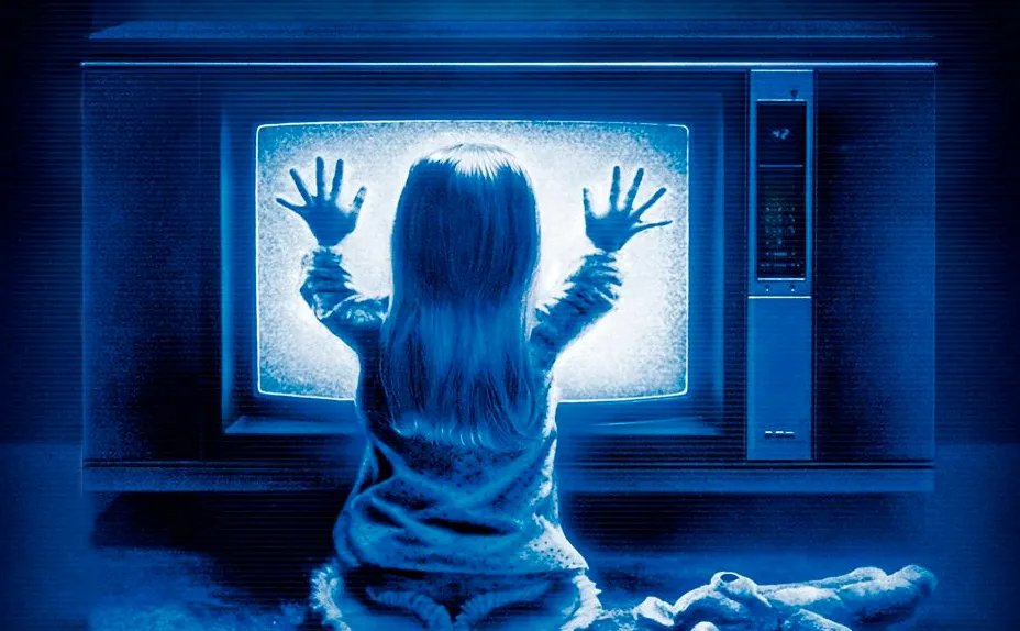 Poltergeist Key Art, Image From Variety, featuring a child placing their hands on an oldschool television