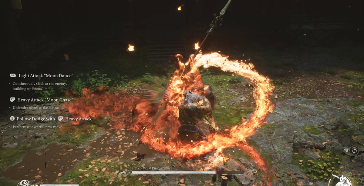 Image of Wukong enmeshed in flames as he uses the Red Tides spell against the Black Wind King