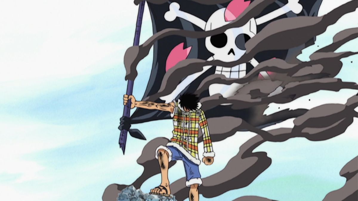 Luffy holding a flag in Drum Island in One Piece.