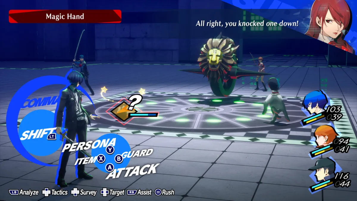 Persona 3 Reload screenshot of the protagonist targeting a knocked-down Magic Hand in battle.