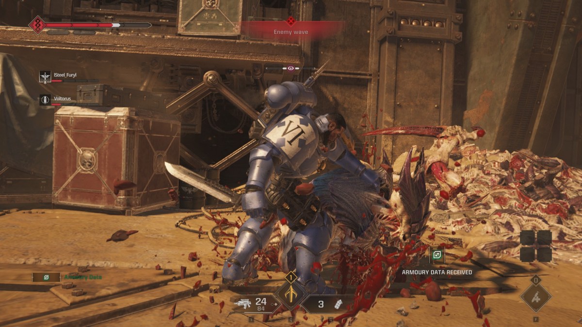 Image of a space marine slamming an alien's head in the ground in Warhammer 40,000: Space Marine 2 with the Armoury Data Received notification in the bottom right 