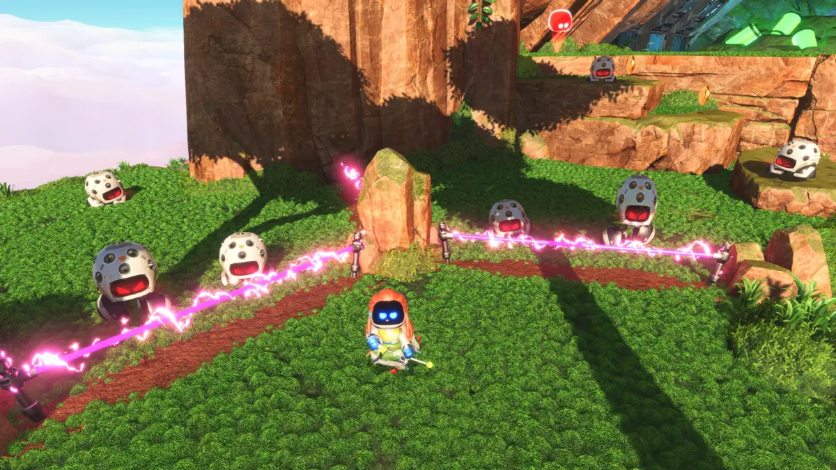 Astro Bot screenshot of an Aloy bot standing in front of tripcaster wire that's holding back seven enemies.