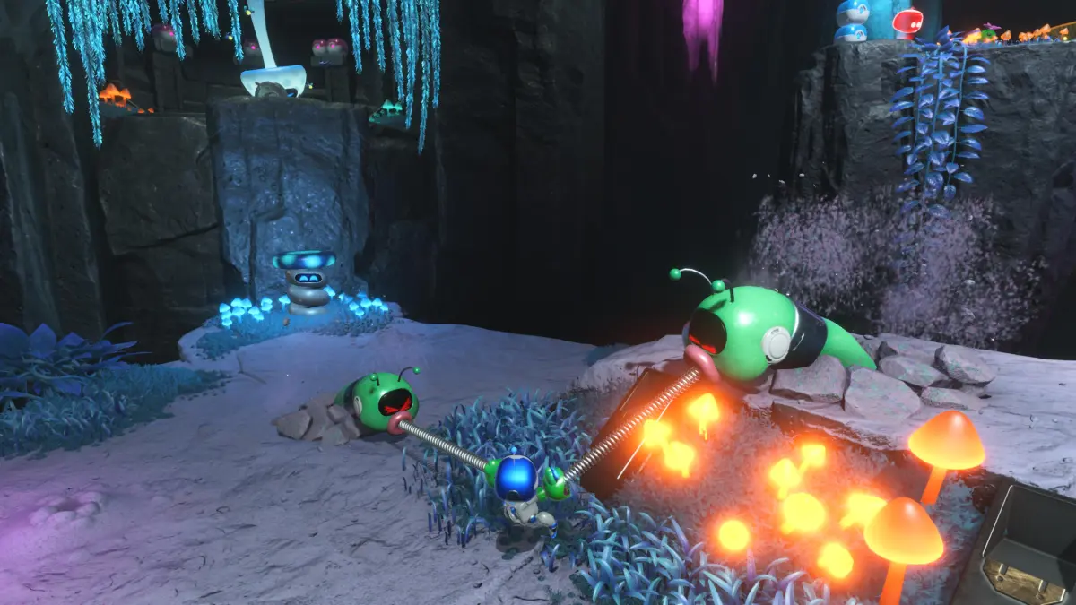 Astro Bot screenshot of Astro using the Twin-Frog Gloves to take down two Wormys at the same time