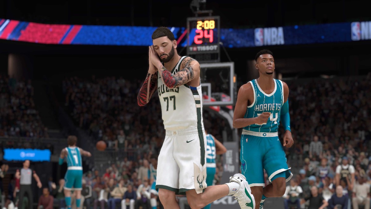 A player hitting an emote after draining a three in NBA 2K25 in an article detailing the best dribble styles