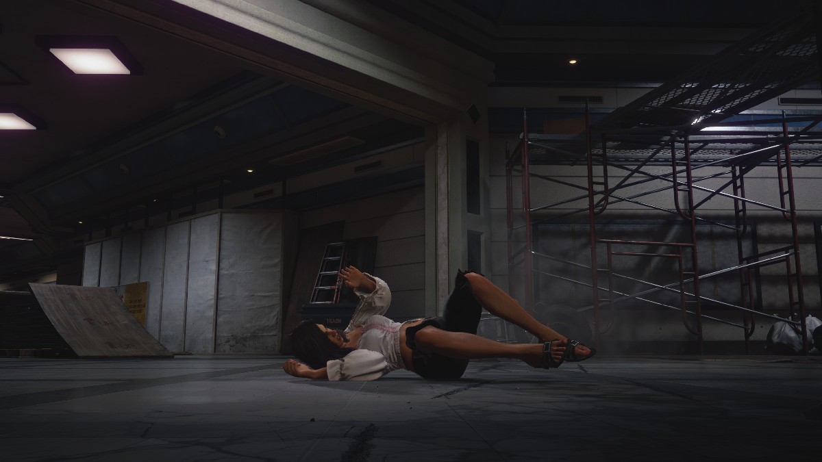 Isabella falling off of her motorcycle after being defeated in Dead Rising Deluxe Remaster