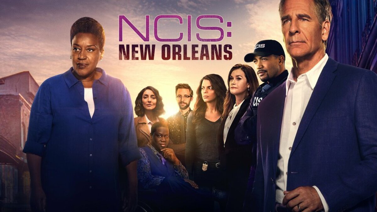 The key art for NCIS: New Orleans, with the main cast assembled in the sunset