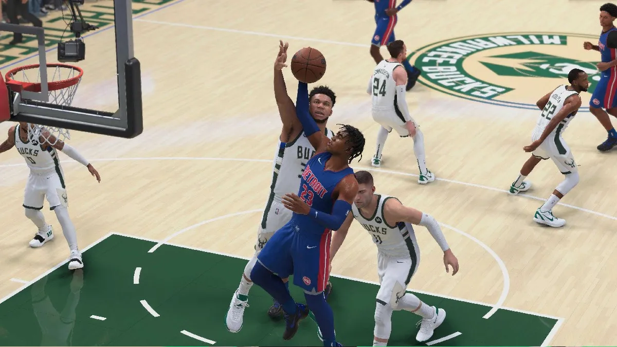 Giannis blocking a shot in the Milwaukee Bucks Stadium in NBA 2K25 in a review of the game