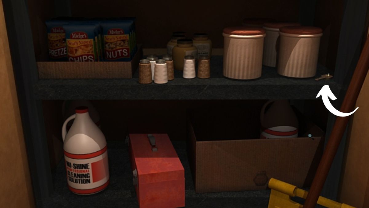 Screenshot of the location of the key to the silverware cabinet in Nancy Drew Warnings at Waverly Academy, with an arrow pointing to the key